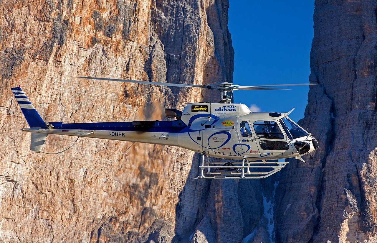 Helicopter, flight, mountains — Implementing Real-Time Data Updates in Full-Stack Applications Using Firebase